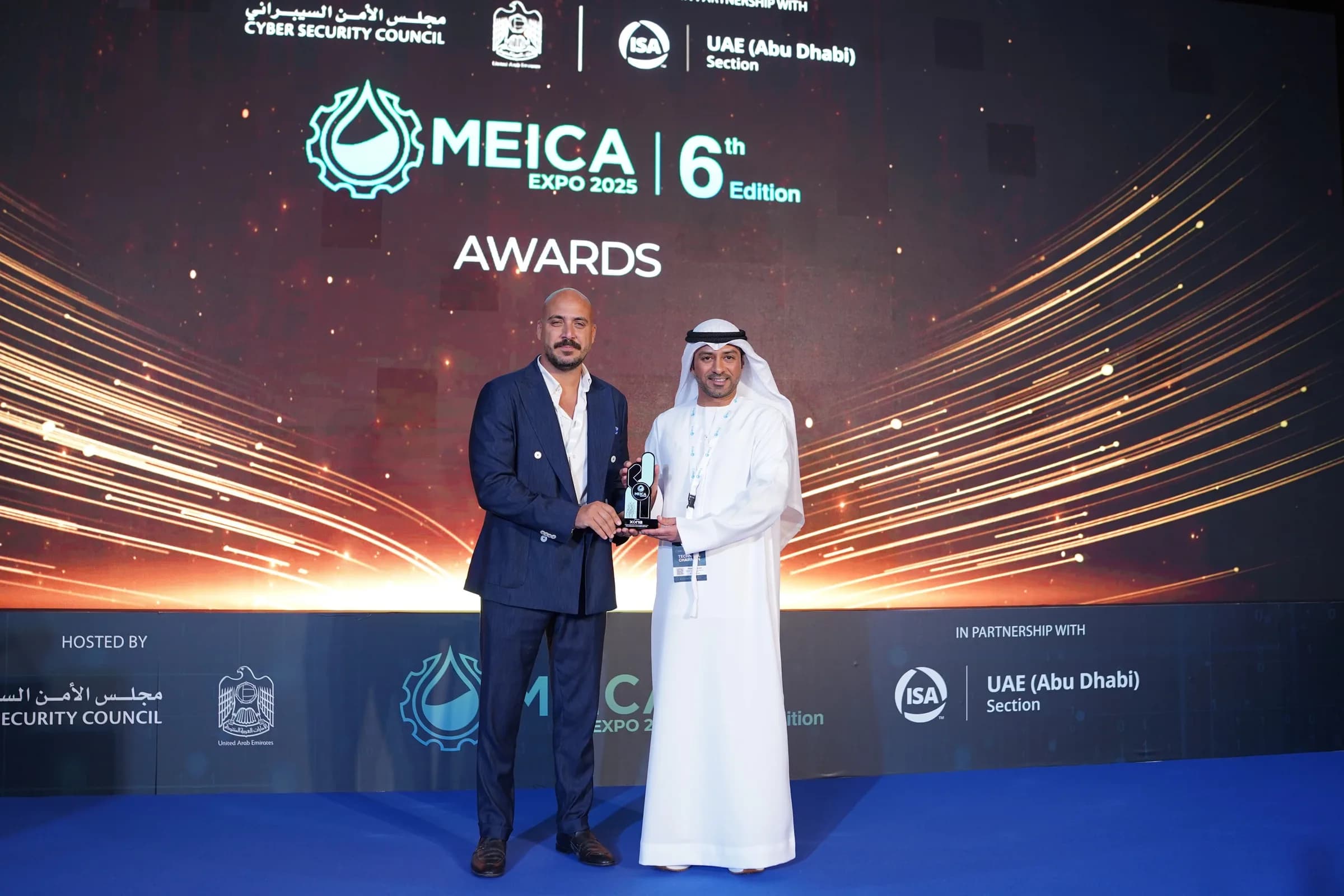 MEICA Awards trophy presentation on stage