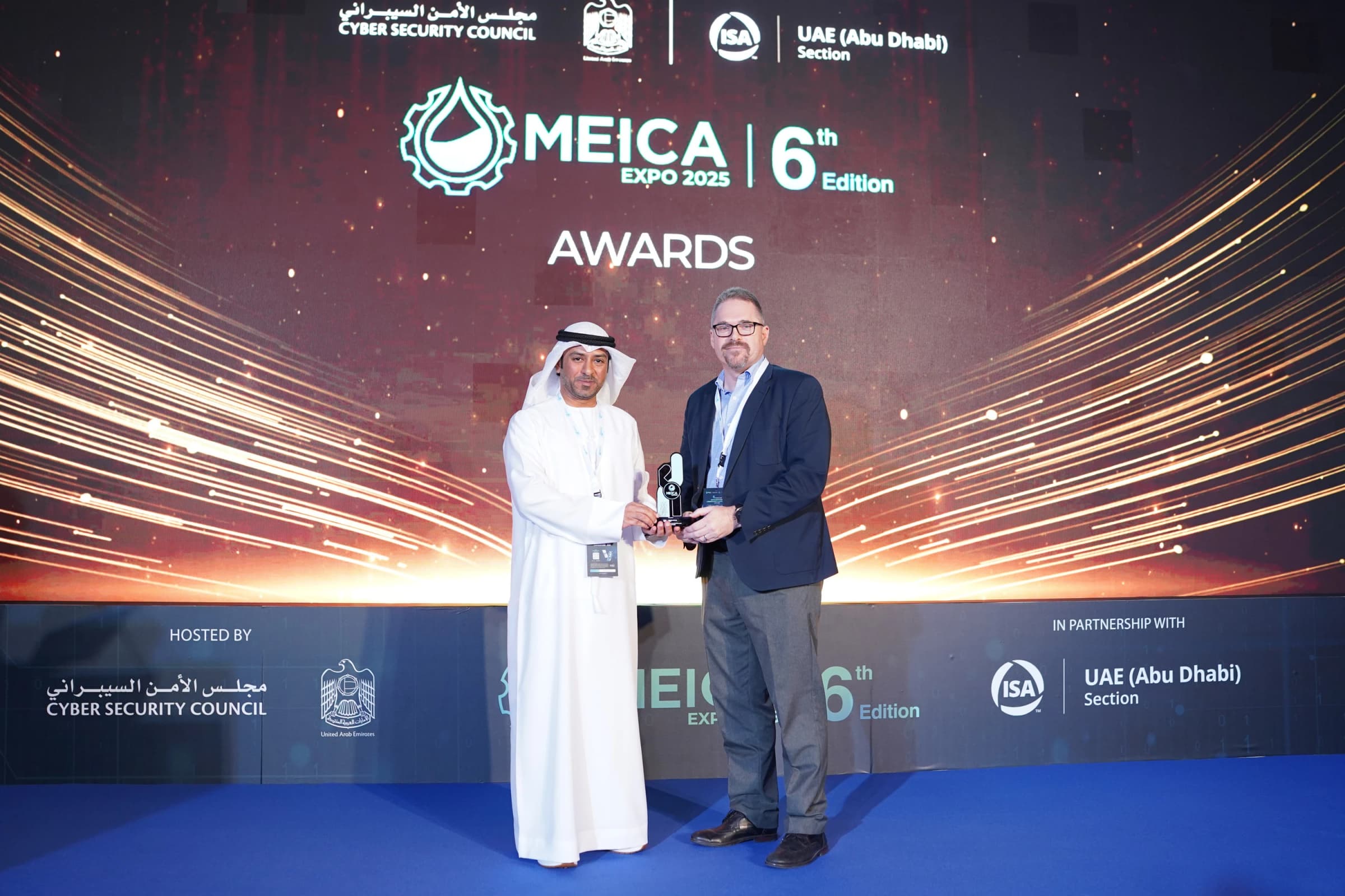 MEICA Awards trophy presentation with award winners on stage